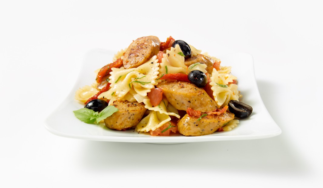 Pasta sauteed with sausage and tapenade