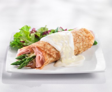 Crepes filled with ham, emmenthal cheese and asparagus